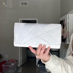 Brand new structured silver clutch